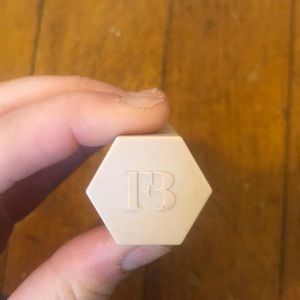 Fenty Beauty Rum colored Shimmer Skinstick